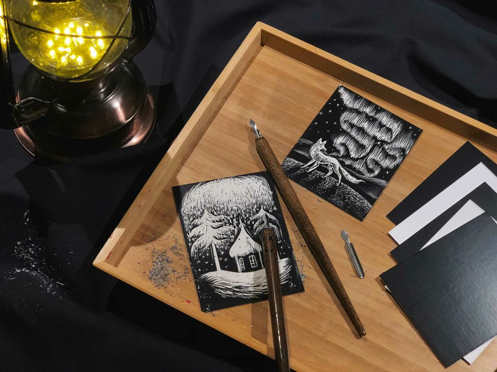 Some scratchboard drawings and tools.